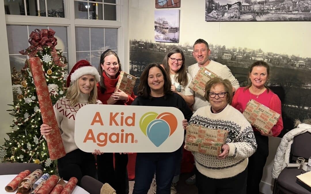 DCF Board Members Wrapped 130 Presents for A Kid Again